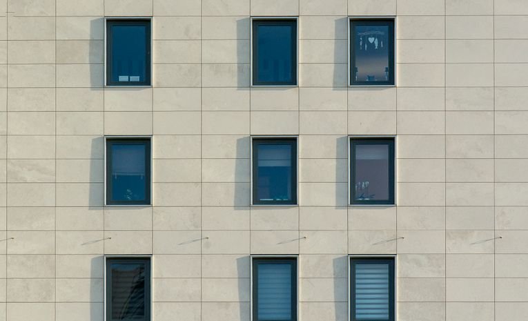 Different window styles on a UK house exterior