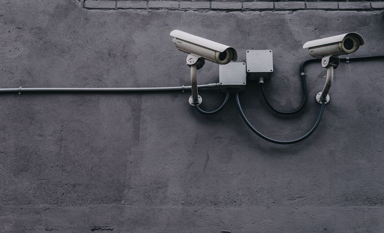 CCTV security camera installed on a house wall