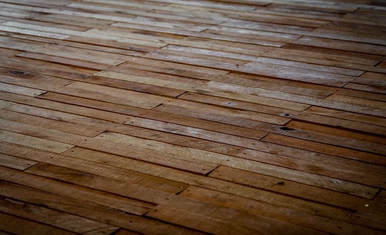 Laminate, vinyl, wood and tile flooring compared for UK homes