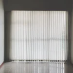 Modern room with ceiling-mounted curtain track