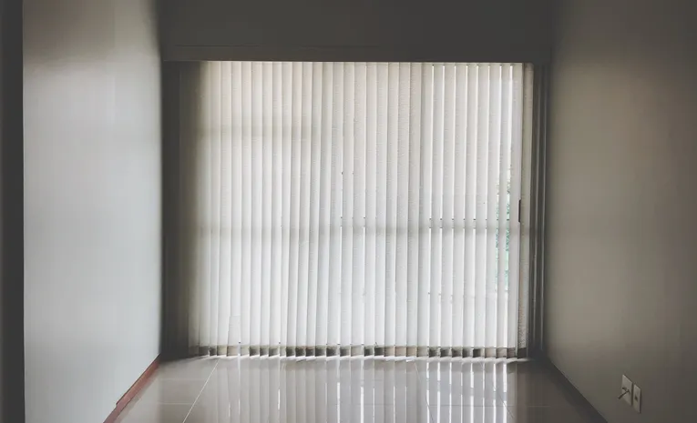 Modern room with ceiling-mounted curtain track