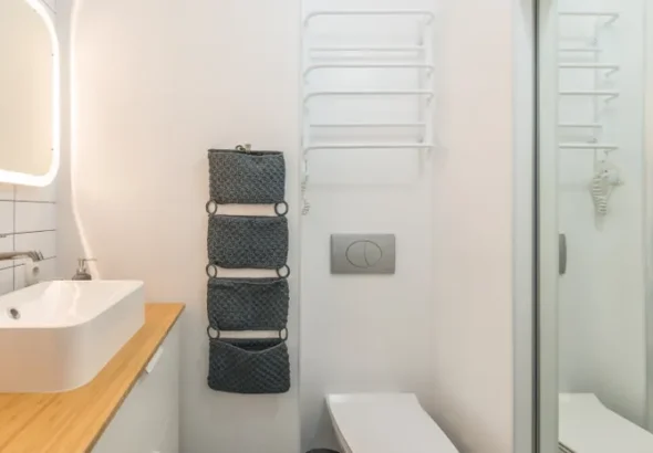 Modern toilet with square shaped seat in a bathroom