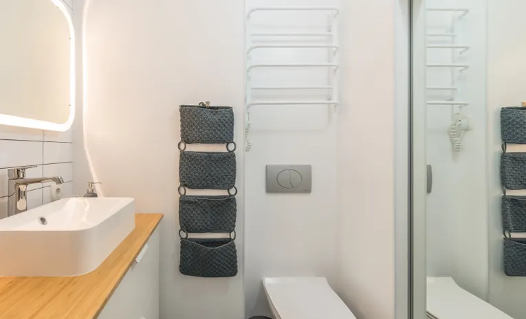 Modern toilet with square shaped seat in a bathroom